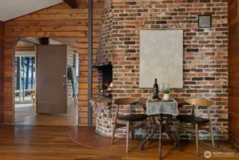 On the other side of the propane living room fireplace, this wood-burning fireplace brings such a cozy, welcoming feel to the kitchen... the kind of feature that makes slow mornings, simmering dinners, and lingering conversations feel even more special.