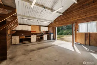 There’s a fabulous workshop area inside the garage, giving you a dedicated space for projects, hobbies, or the kind of practical work that’s easier when everything has its place.