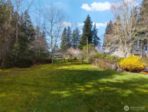 Here you can really appreciate what makes this property so special... a nearly flat 2.15-acre lot + a lovely orchard that adds warmth, beauty, and a storybook kind of charm. It all comes together in a way that feels open, inviting, and increasingly hard to find.