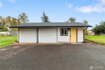 Two car garage and additional living space off garage.