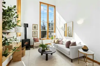 The south facing living room has walls of windows and 18" cathedral ceilings.
