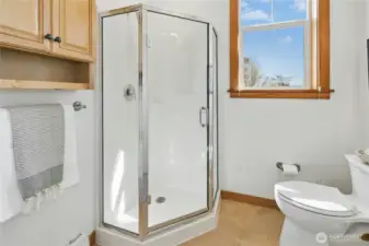 Main floor 3/4 bathroom adjacent to bedroom.