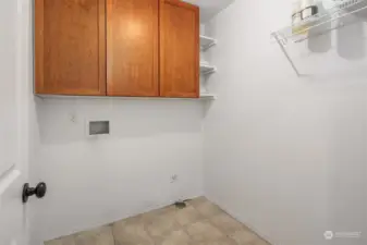Large laundry room, conveniently located between all of the bedrooms upstairs.