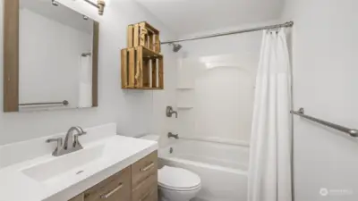 Beautifully updated main floor bathroom featuring modern finishes and stylish design for a fresh, elegant look.