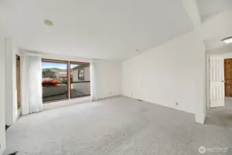 Living room with large picture windows.