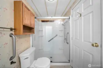 Guest/main bathroom with huge walk-in shower.