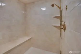 Luxurious 5-piece primary bath will make you feel like you're in a spa.