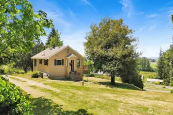 The 1-79 acre property has so much potential...flat areas and a gentle slope to Colony Road