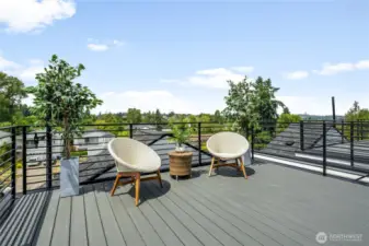 Sunny deck with  city, mountain and territorial views