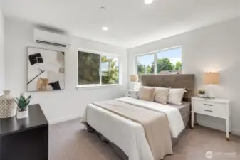 Good-sized primary bedroom with A/C