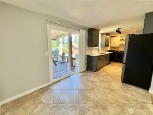 Eating space opens up onto covered deck
