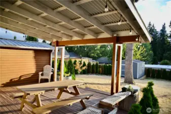 Perfect evening sunlight onto deck, kitchen, and eating space