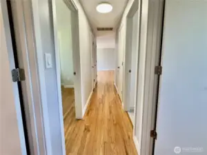 Hallway to bedrooms and bath