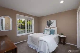 PRIMARY BEDROOM WITH LOTS OF NATURAL LIGHT FROM OVERSIZED WINDOW