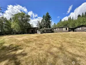 Over 5 acres. Plenty of privacy, surrounded by trees.