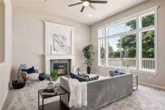 Light-filled living room combines high ceilings with timeless comfort and style.