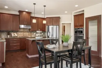 Beautifully designed kitchen and breakfast nook - perfect for casual dining.