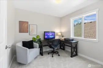 Fourth bedroom upstairs/staged as office