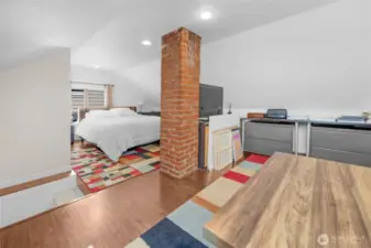 The upper level is the large primary suite.