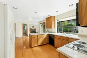 Flooded with natural light, this kitchen is central and open to the main level.
