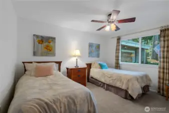 Another large guest bedroom w/ceiling fan.