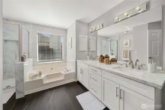 All new cabinetry and double vanity with quartz countertops and new flooring!