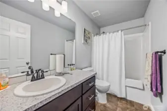 Upstairs modern full bath (between flex room and bedroom 5)