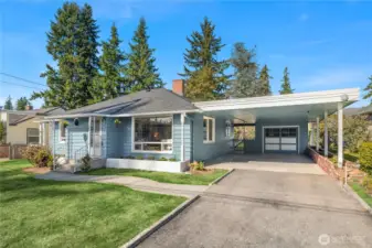 Curb appeal shines! Fresh exterior paint, a brand-new roof, and a welcoming covered entry make this Everett classic stand out. The carport and one-car garage offer easy parking and protection from the PNW weather.