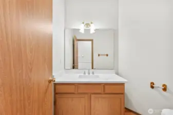 1/2 bath located on main floor near utility room.
