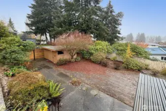 View from the deck looking to the lower yard and shop.