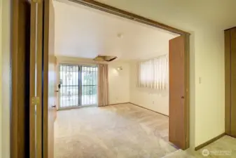 Bedroom downstairs that walks out to carport and back yard.