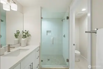 Large shower in the ensuite bath and plenty of storage in the vanity.