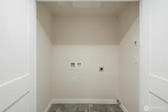 Large closet with laundry hookups.