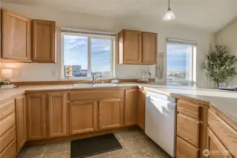 Watch for whales and king tides out this South facing kitchen window.