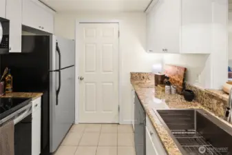 Granite counters, smart storage, and everything right where you need it - efficient in the best possible way.