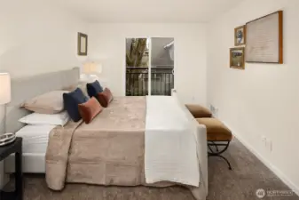 Generously sized primary retreat with western light in the afternoons and ample room to comfortably accommodate a king-sized bed.