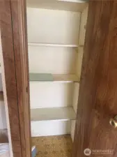 Pantry closet in the entry between your washer/dryer and your kitchen for storage