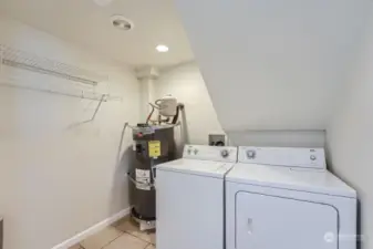 Lower Level Laundry Room- Brand new RHEEM Hot water heater & expansion tank.