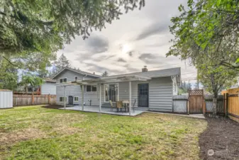 Another view of backyard, fully fenced and Shed