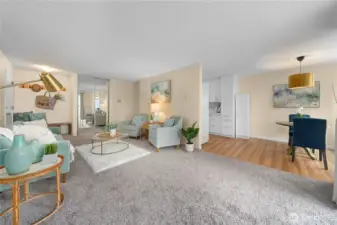 Living flows to the dining and kitchen area.