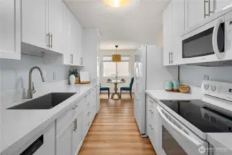Well-appointed kitchen features updated cabinets and countertops!