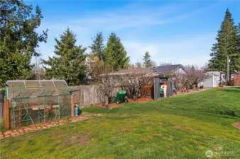 This home faced east / west. Perfect to put your seedling's in the greenhouse for planting later
