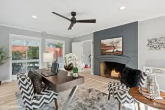 Great room with custom mosaic fireplace.