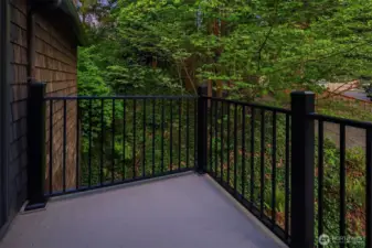 The patio off of the upstairs primary bedroom