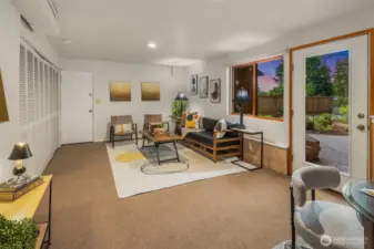 The lower level downstairs is fully finished and behind the closet doors is a full size washer and dryer.