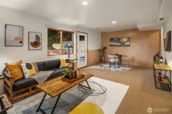 Another view of the downstairs living area with easy access to the backyard.