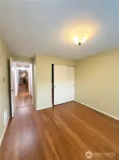Second bedroom with built-in shelving