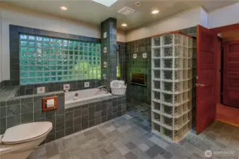Primary bath as large 0 clearance access to the shower, an oversized soaking tub, vanity and lots of natural light!