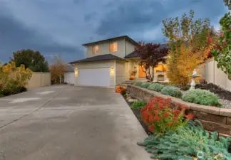 Fresh exterior paint and great curb appeal with new fencing and mature landscaping.