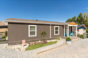 Front of home. Double-pane, screened windows.